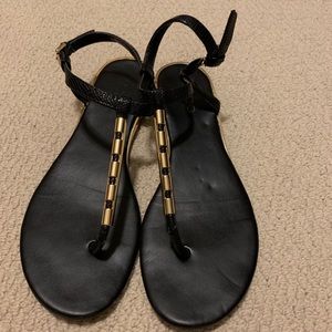 Black and gold sandals